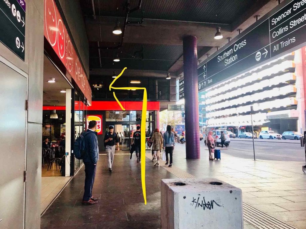 arrow and people walk on the street